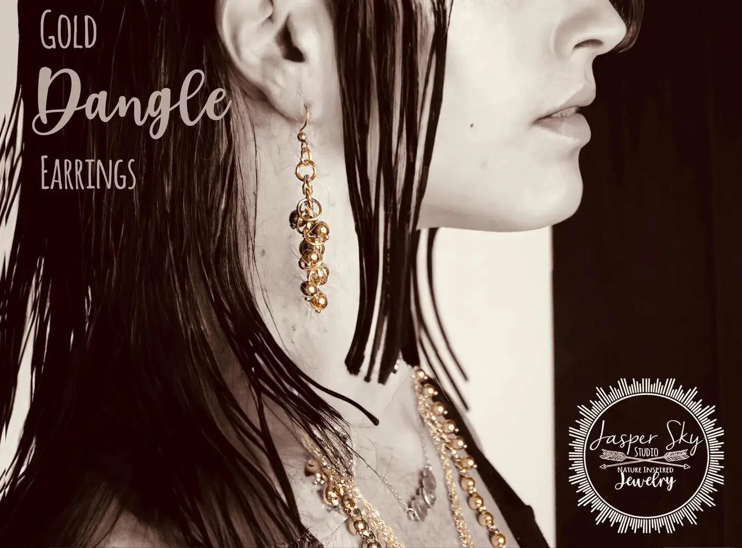 Model wearing clustered Handcrafted Gold Long Dangle Earrings with matching necklace, showcasing a bold and stylish jewelry gift.