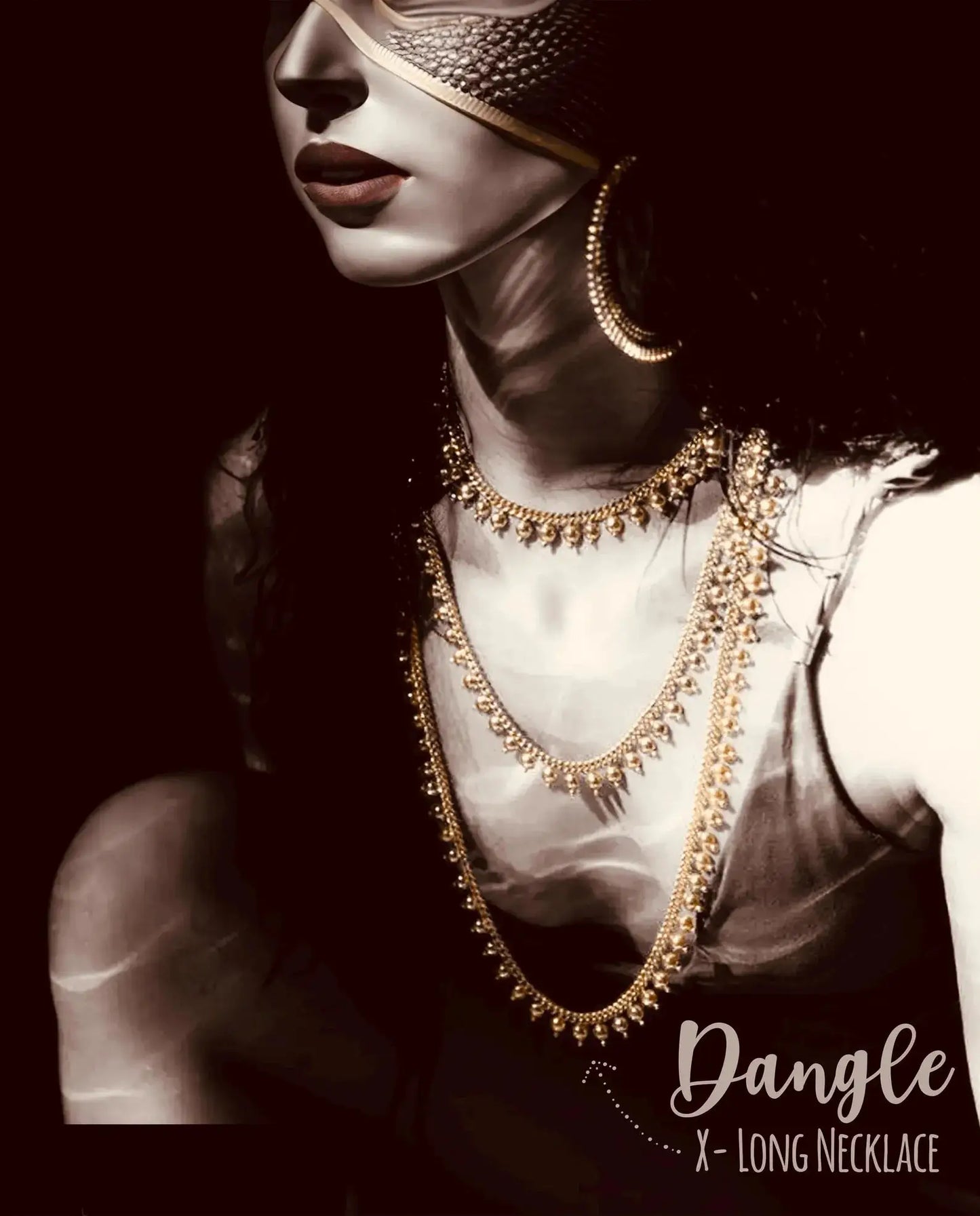 Model adorned in layered gold dangle necklaces matching the Handcrafted Gold Long Dangle Earrings, perfect for a dramatic jewelry look.