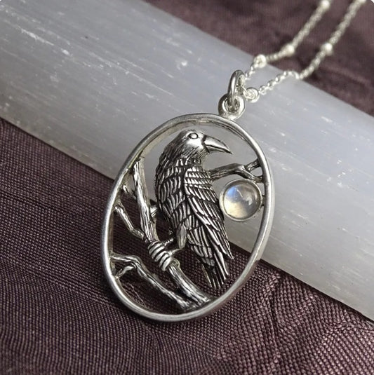 Unveiling the Meaning Behind Raven Pendant and Sacred Heart Necklace