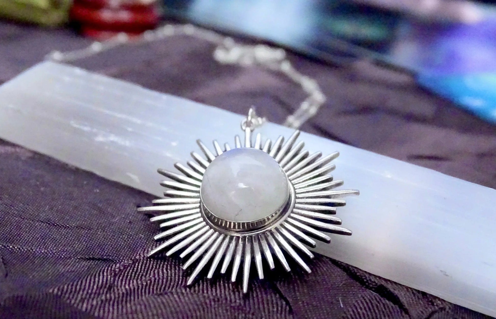 Sterling silver sun pendant