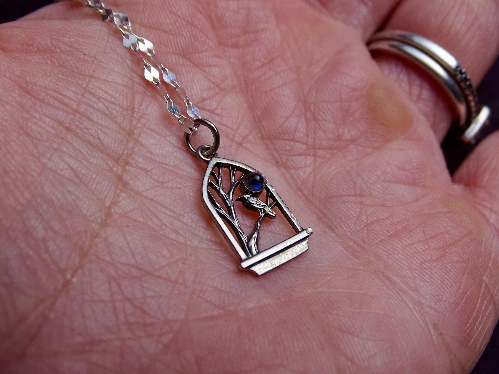 Raven Pendant Necklace