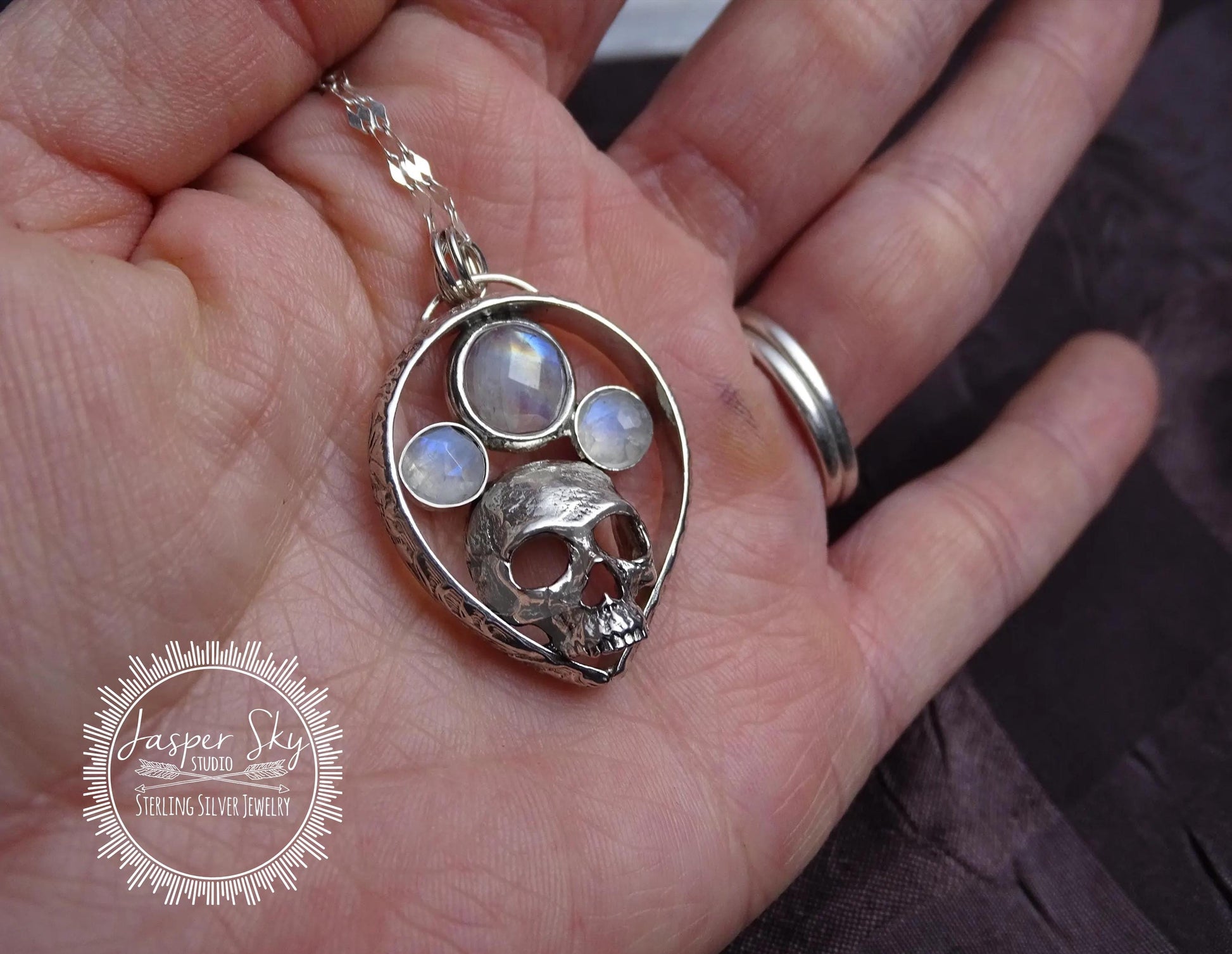 Skull Pendant in Sterling Silver with Rainbow Moonstones